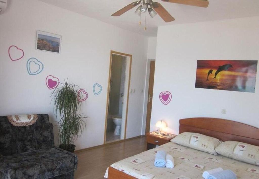 Łóżko lub łóżka w pokoju w obiekcie Apartments and Room Dar
