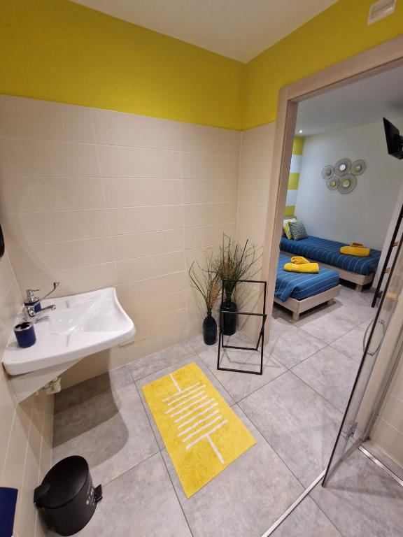 Postel nebo postele na pokoji v ubytování Casa Rosso Blu