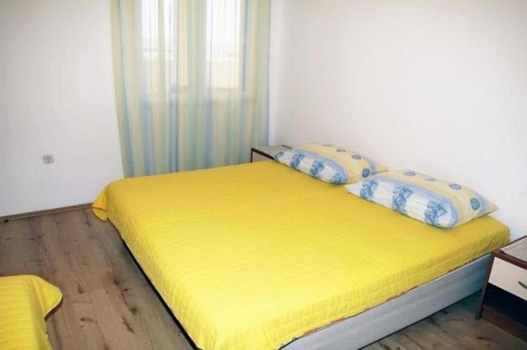 Posteľ alebo postele v izbe v ubytovaní Apartments Sini