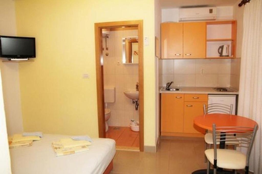 Kuchyňa alebo kuchynka v ubytovaní Apartments Sini