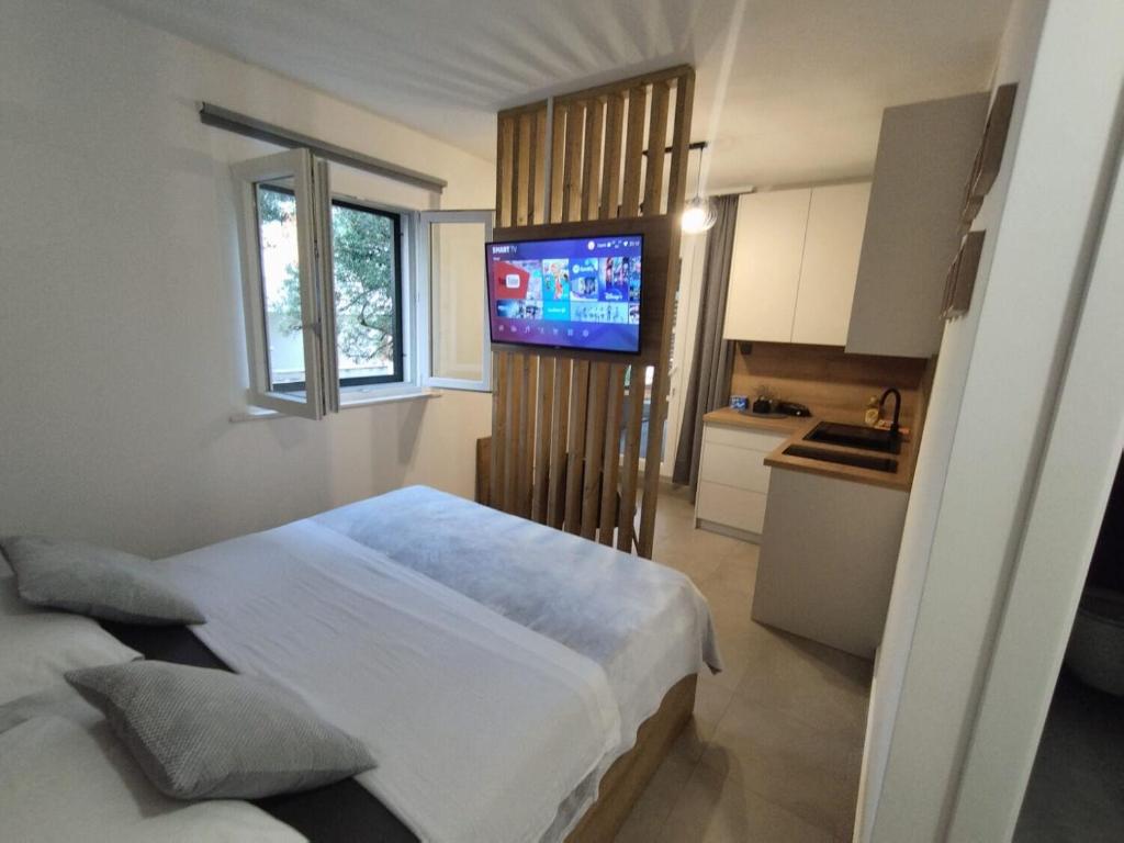 Posteľ alebo postele v izbe v ubytovaní Apartment Martina