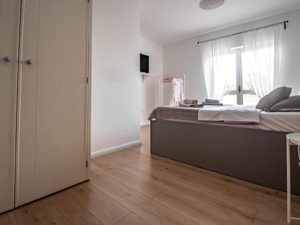 Posteľ alebo postele v izbe v ubytovaní Apartment Martina