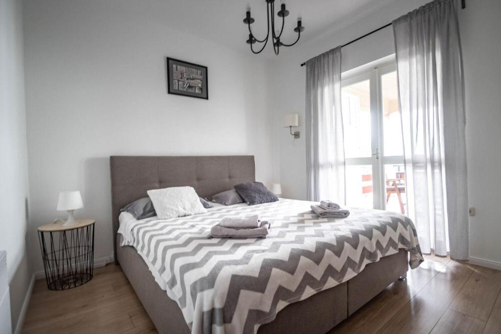 Posteľ alebo postele v izbe v ubytovaní Apartment Martina