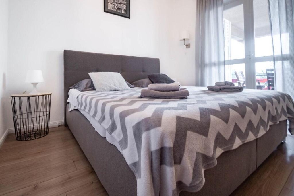 Posteľ alebo postele v izbe v ubytovaní Apartment Martina