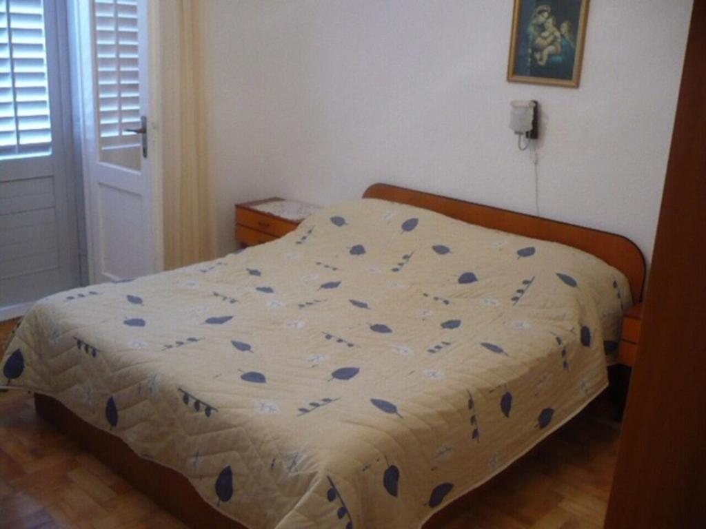 Posteľ alebo postele v izbe v ubytovaní Apartment Eta