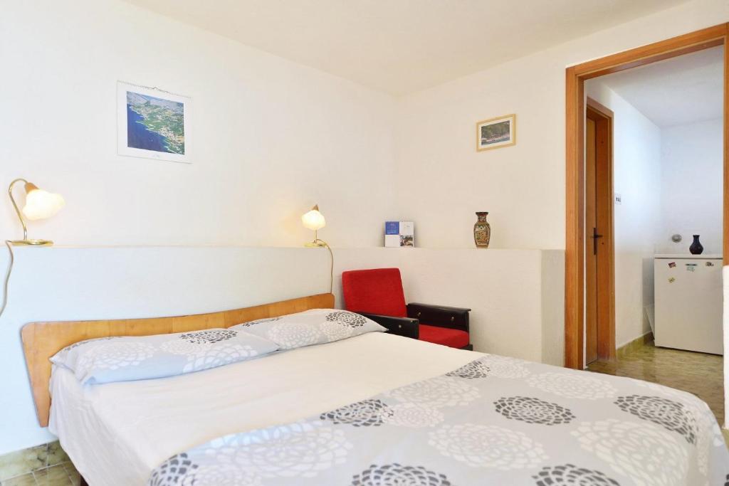 Posteľ alebo postele v izbe v ubytovaní Apartments Goran