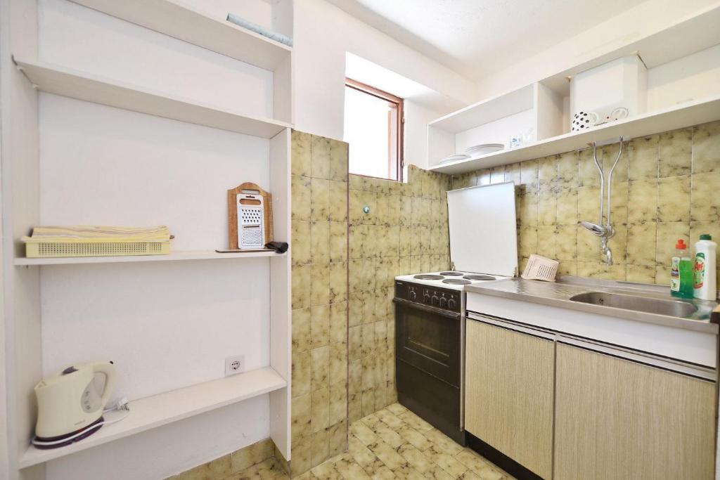 Kuchyňa alebo kuchynka v ubytovaní Apartments Goran