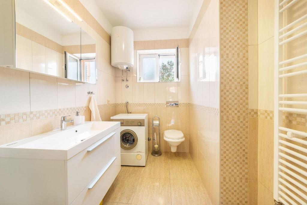 Koupelna v ubytování Apartment Goge