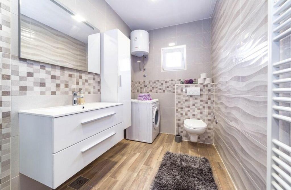 Koupelna v ubytování Apartment Goge