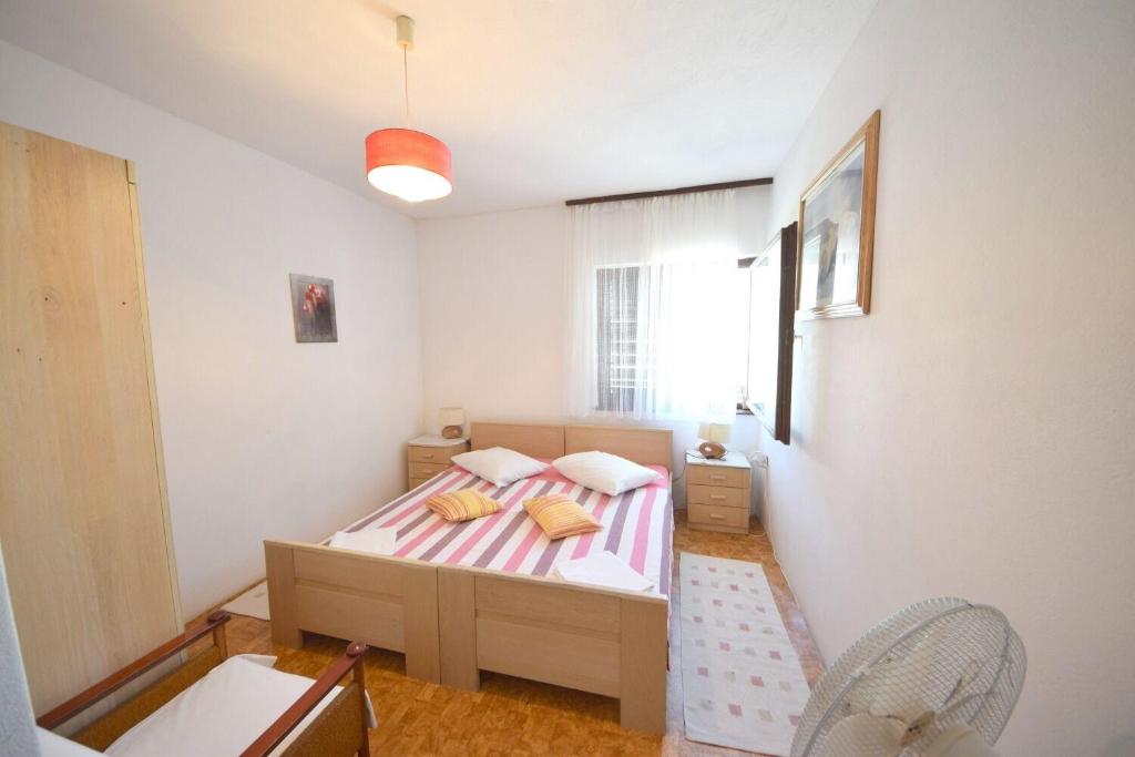 Posteľ alebo postele v izbe v ubytovaní Rooms Smilje
