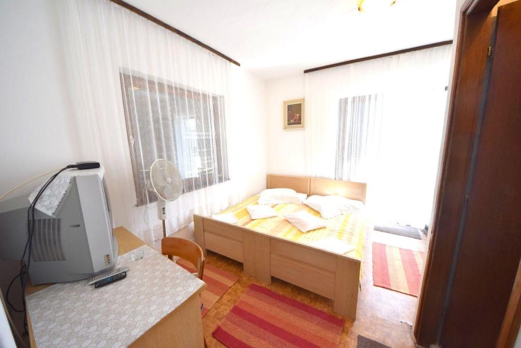 Posteľ alebo postele v izbe v ubytovaní Rooms Smilje
