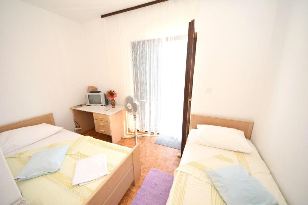 Posteľ alebo postele v izbe v ubytovaní Rooms Smilje