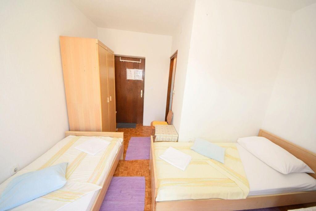 Posteľ alebo postele v izbe v ubytovaní Rooms Smilje