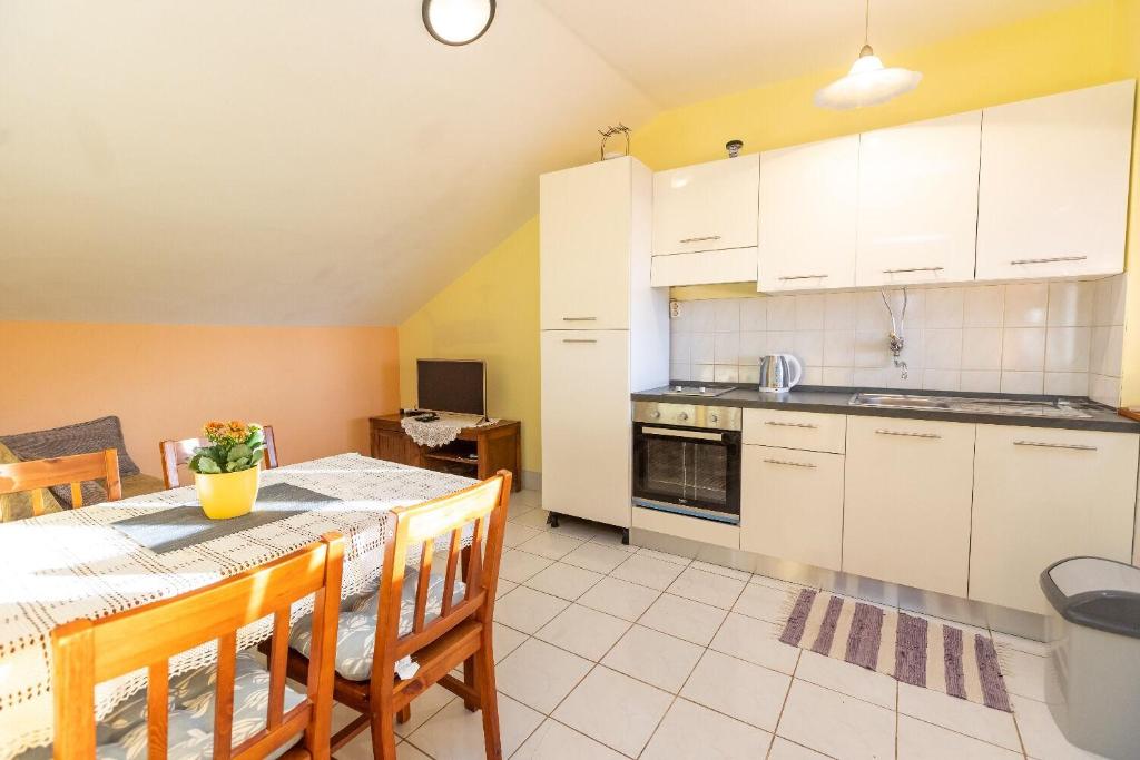 Kuchyň nebo kuchyňský kout v ubytování Apartments Vesna