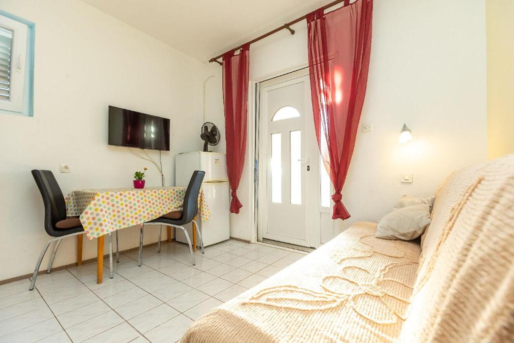 TV a/nebo společenská místnost v ubytování Apartments Vesna