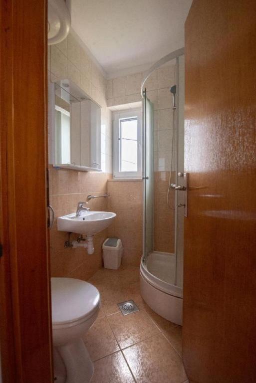 Koupelna v ubytování Apartments Mir