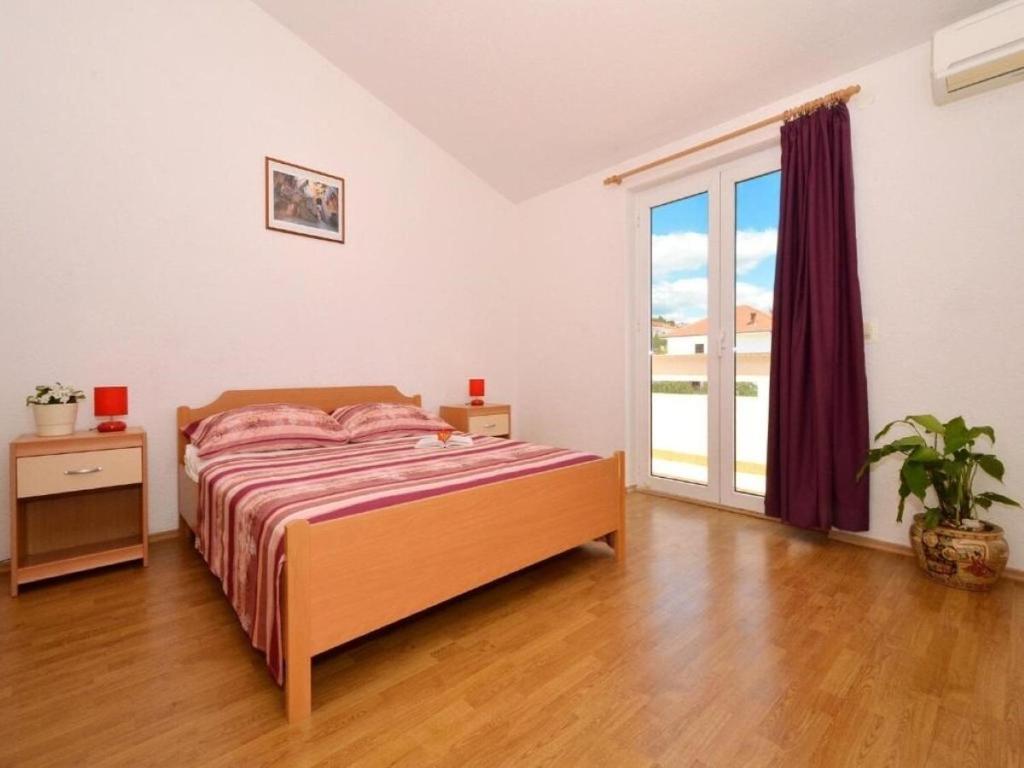 Posteľ alebo postele v izbe v ubytovaní Apartments Zar