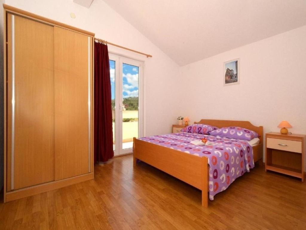 Posteľ alebo postele v izbe v ubytovaní Apartments Zar
