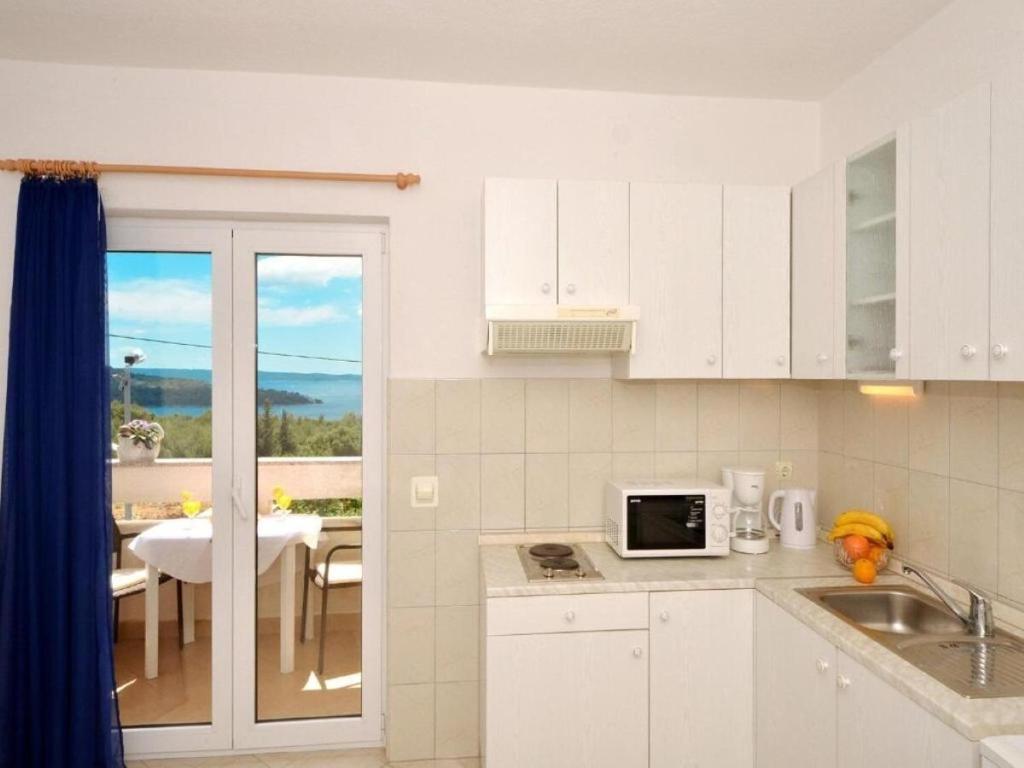 Kuchyňa alebo kuchynka v ubytovaní Apartments Zar