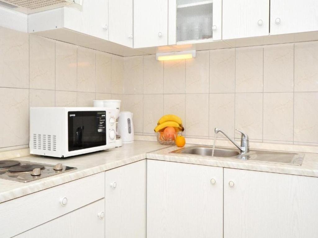 Kuchyňa alebo kuchynka v ubytovaní Apartments Zar