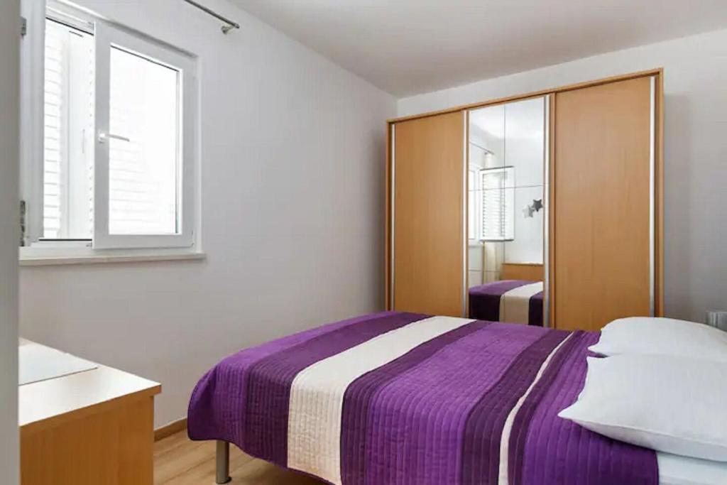 Posteľ alebo postele v izbe v ubytovaní Apartment Ljilja