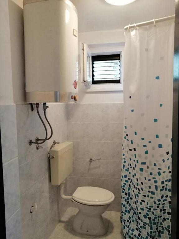 Kúpeľňa v ubytovaní Apartments Branko