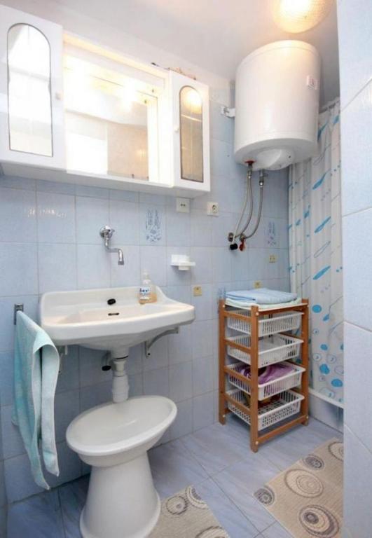 Koupelna v ubytování Apartments Roki