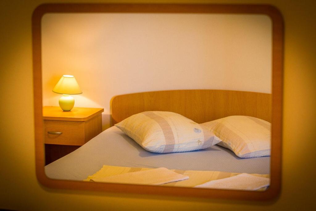 Posteľ alebo postele v izbe v ubytovaní Apartments Saga