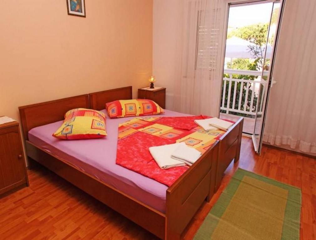 Posteľ alebo postele v izbe v ubytovaní Apartments Marija