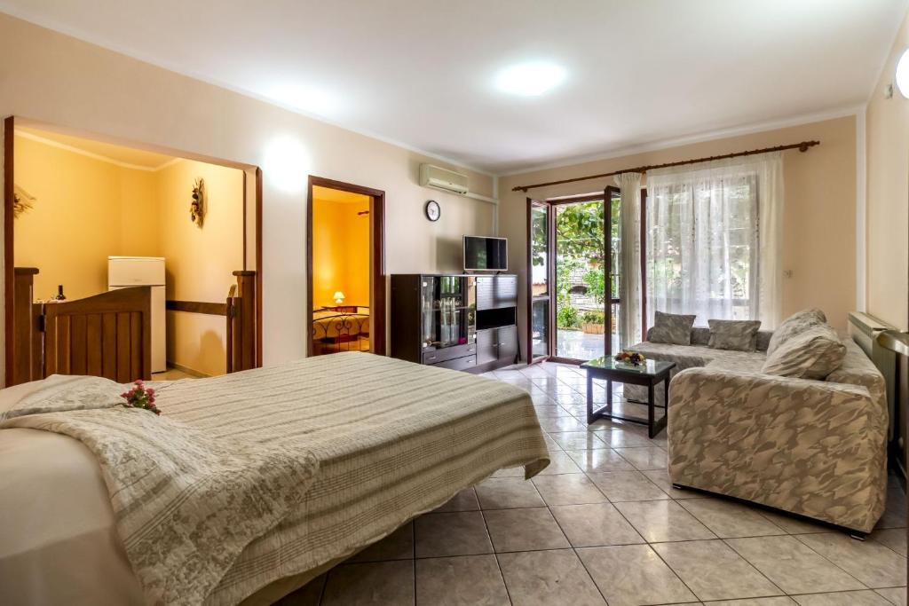 Postel nebo postele na pokoji v ubytování Apartments Mir