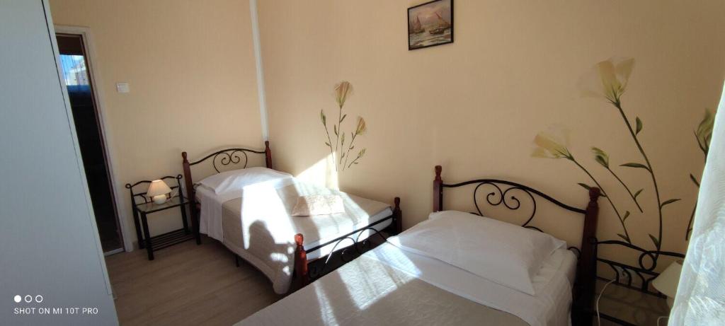 Łóżko lub łóżka w pokoju w obiekcie Apartment Nadica