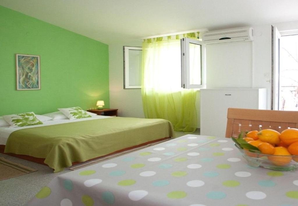 Posteľ alebo postele v izbe v ubytovaní Apartments Filip