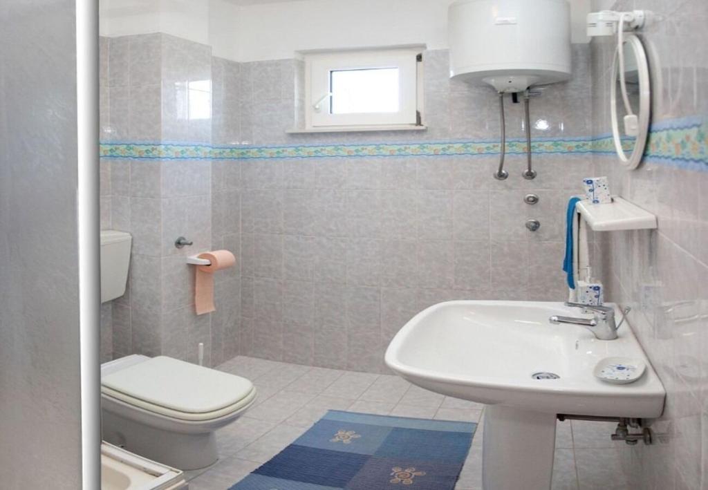 Kúpeľňa v ubytovaní Apartments Filip