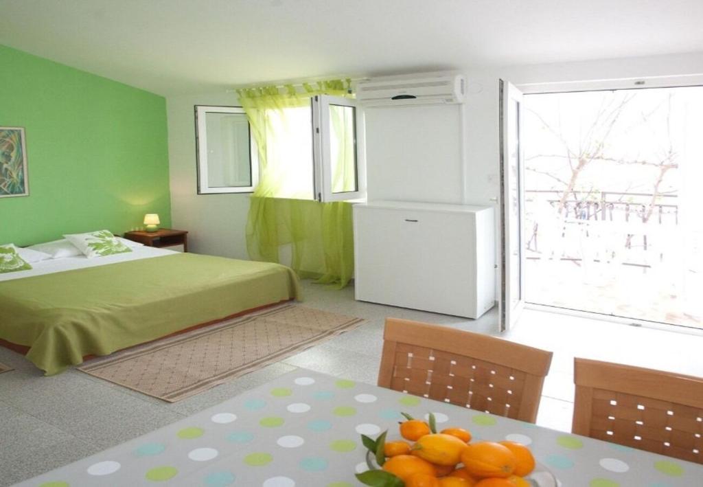 Posteľ alebo postele v izbe v ubytovaní Apartments Filip