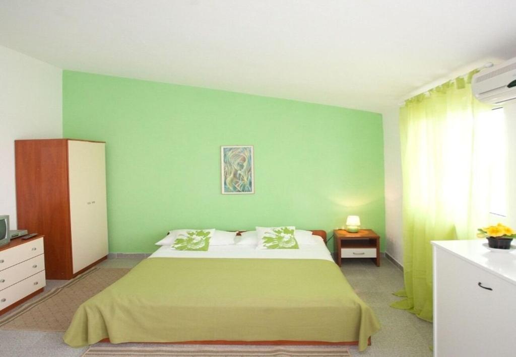 Posteľ alebo postele v izbe v ubytovaní Apartments Filip