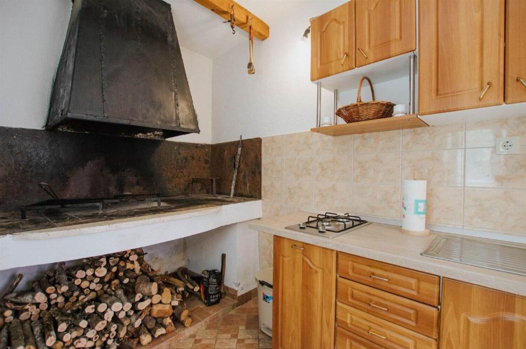 Kuchyň nebo kuchyňský kout v ubytování Apartments Dome