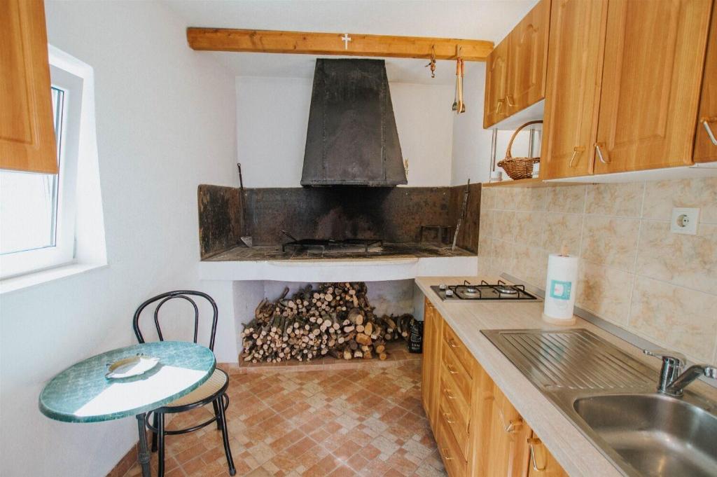 Kuchyň nebo kuchyňský kout v ubytování Apartments Dome
