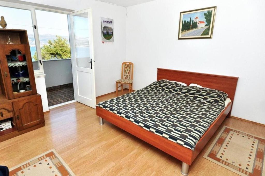 Postel nebo postele na pokoji v ubytování Apartments Dome