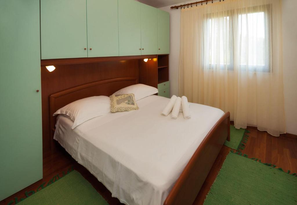 Postel nebo postele na pokoji v ubytování House Lucmar