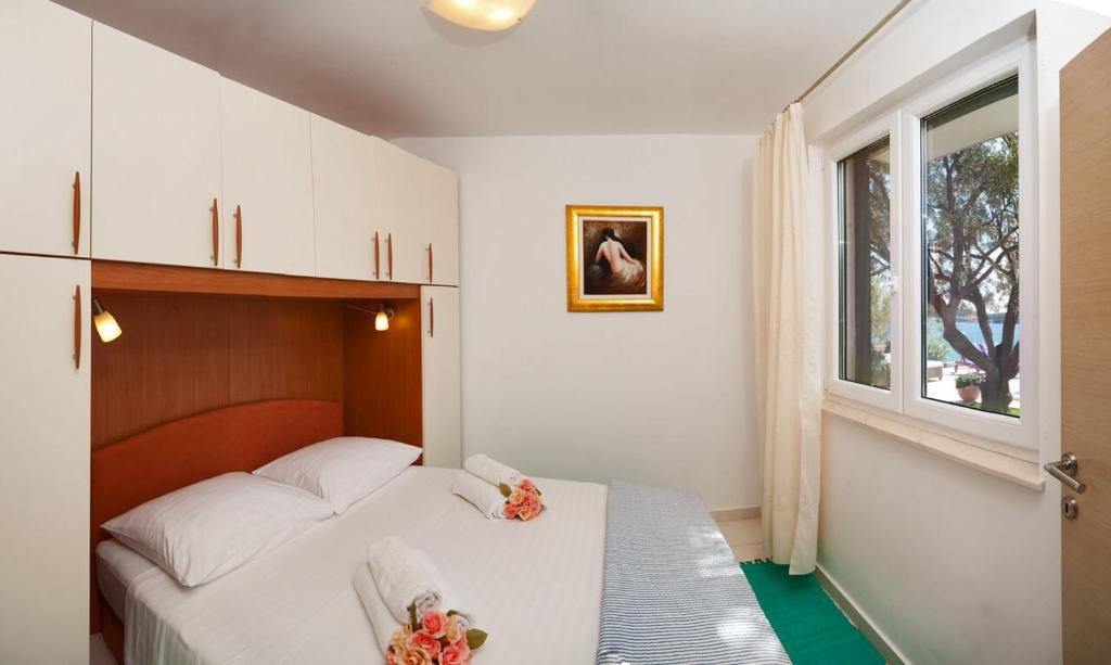 Postel nebo postele na pokoji v ubytování House Lucmar