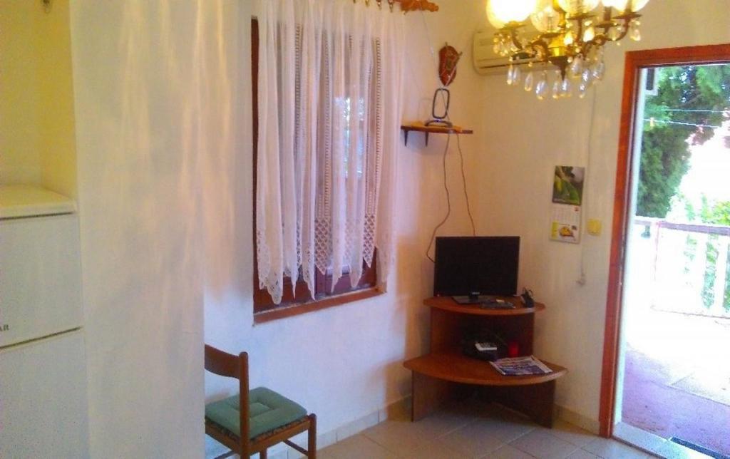 Televízia a/alebo spoločenská miestnosť v ubytovaní Apartment Irmica