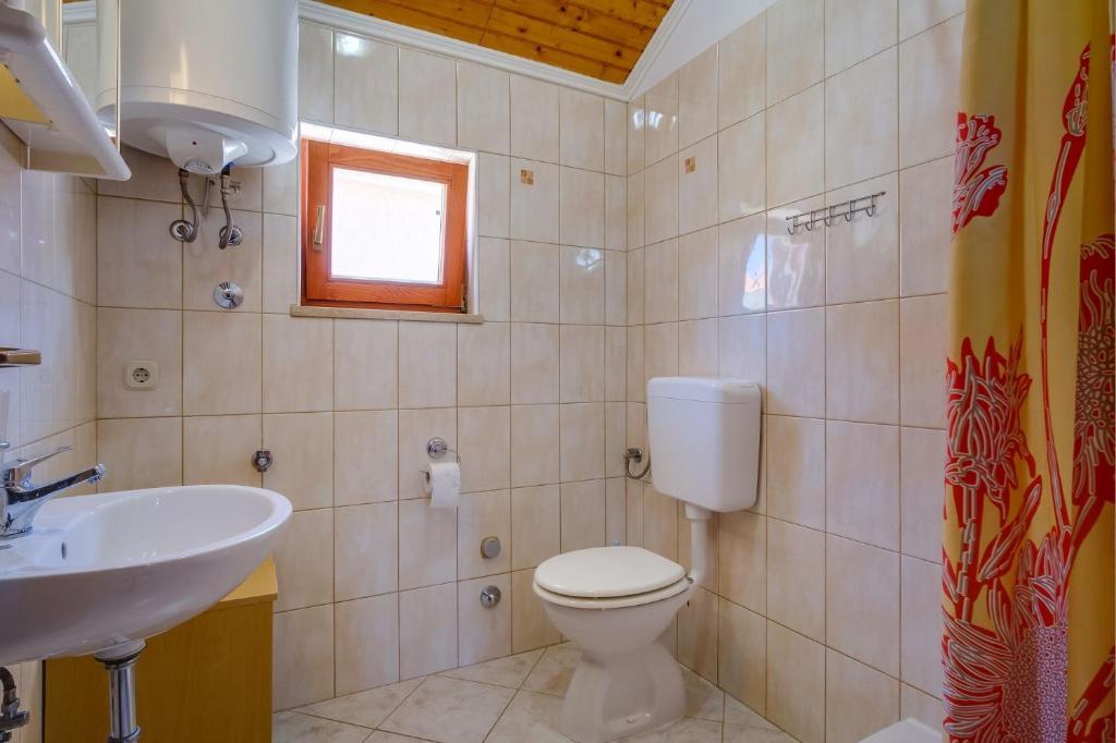 Koupelna v ubytování Apartments Stipe