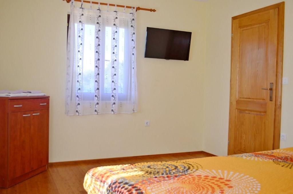 Postel nebo postele na pokoji v ubytování House Mary