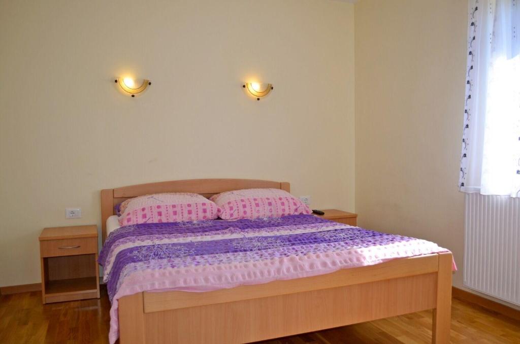 Postel nebo postele na pokoji v ubytování House Mary