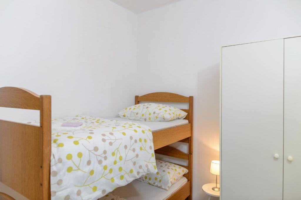Postel nebo postele na pokoji v ubytování Apartment Vesna
