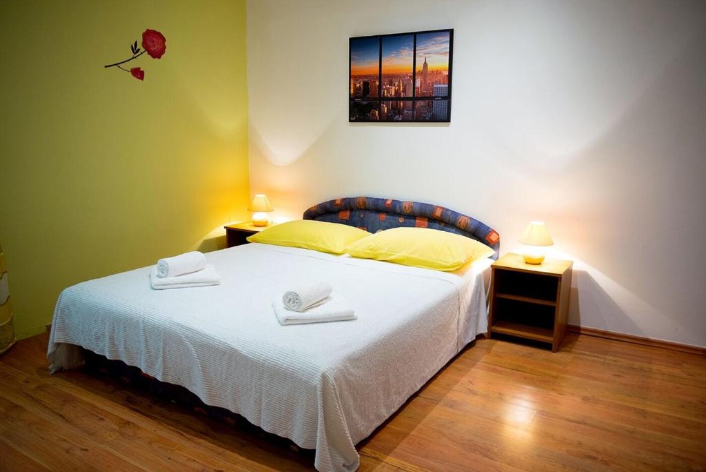Posteľ alebo postele v izbe v ubytovaní Apartments and Rooms Robi