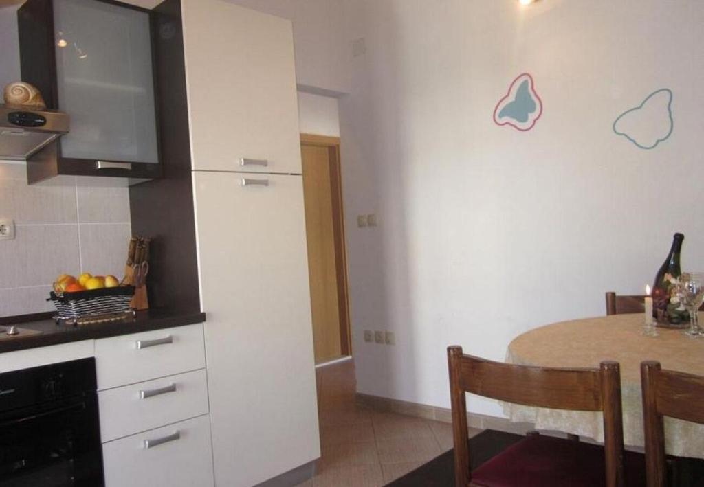 Kuchyňa alebo kuchynka v ubytovaní Apartments Sto