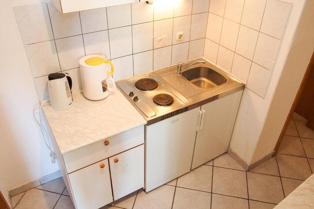 Kuchyň nebo kuchyňský kout v ubytování Apartments Ruza