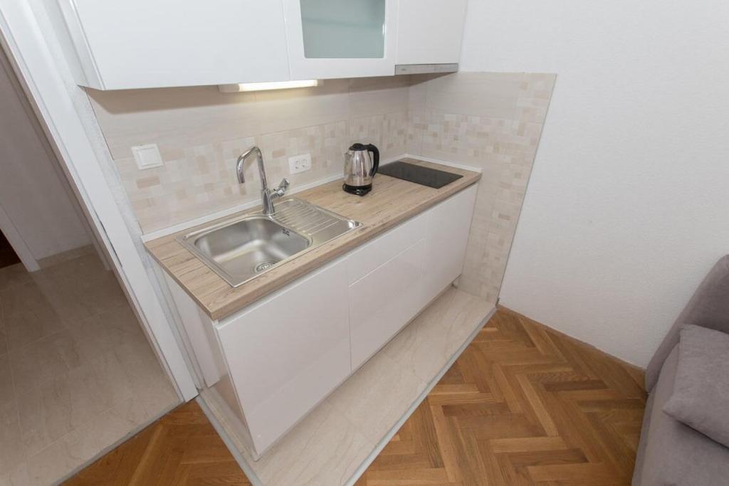 Kuchyň nebo kuchyňský kout v ubytování Apartments Ruza