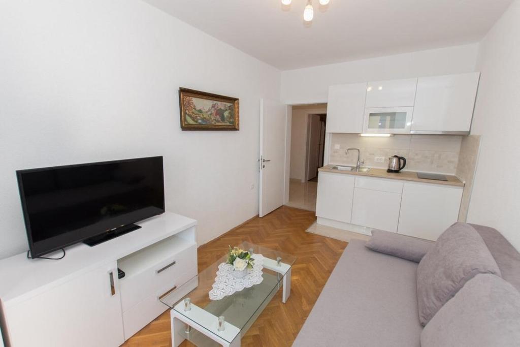 Kuchyň nebo kuchyňský kout v ubytování Apartments Ruza